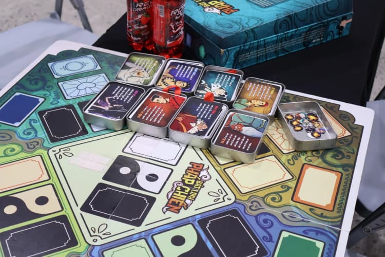 Road to Essen prototype game components on the table